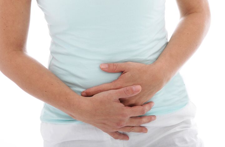 One of the signs of cystitis in a woman is an annoying pain in the lower abdomen